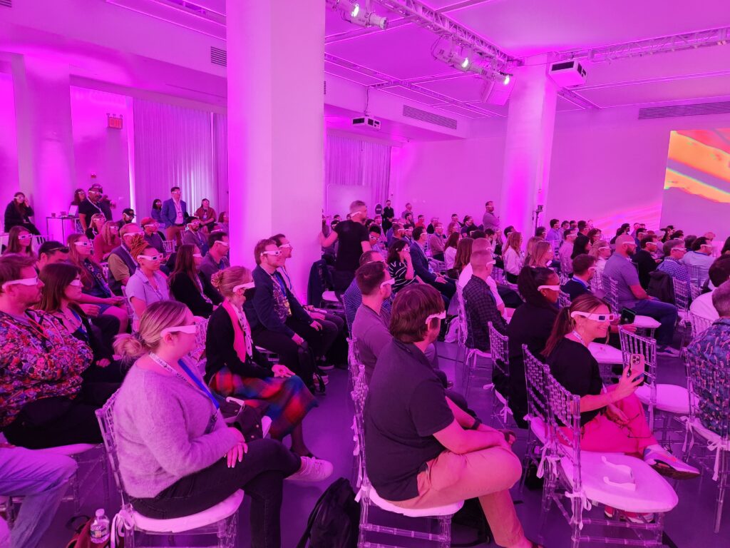 Crowd at SEO Week wearing 3D glasses